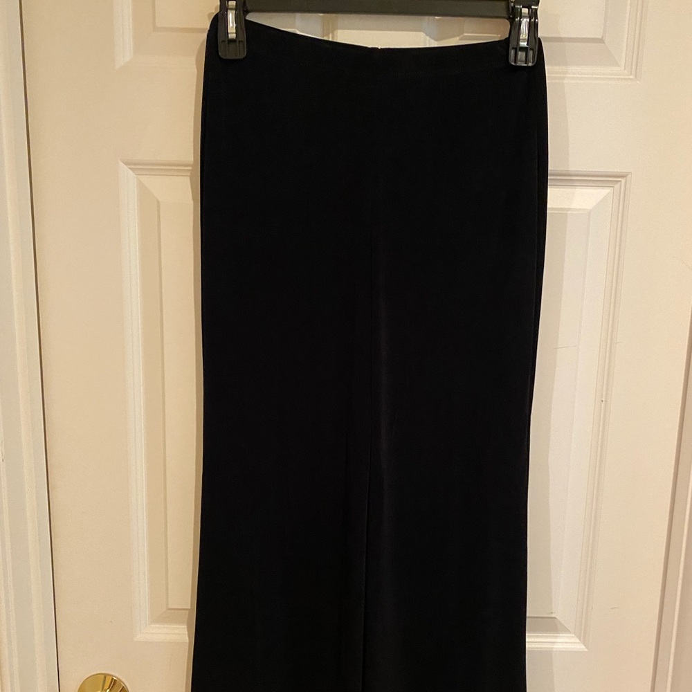 Womens Chico travelers pants in black.  Worn once by my mom.   Like new.  Black